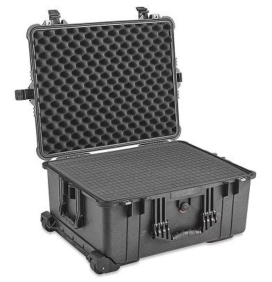 The case open, foam cut to hold a Raptor X18, its adapter and its cables